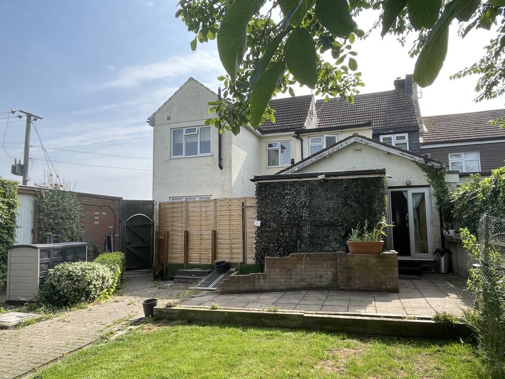 Lot: 108 - A LARGE SEMI-DETACHED HOUSE WITH SELF-CONTAINED ANNEX IN A RURAL SETTING - View to rear of rural house with annexe
